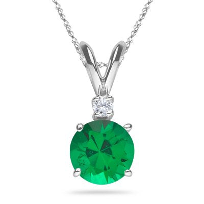 0.03 Cts Diamond & 0.50-0.73 Cts of 5.5 mm AAA Round Natural Emerald Pendant in Platinum